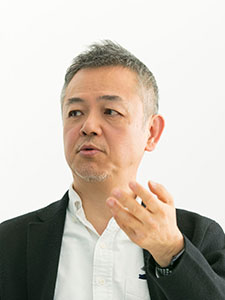 塚田雅人氏