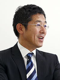 間野義之氏