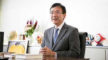 村井 満氏